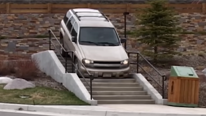 A Chevrolet Trailblazer bounces down a flight of stairs